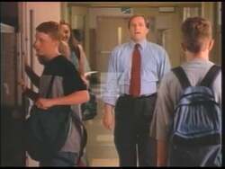 ["The 1998 political TV ad for Democratic Party candidate Mike Capuano showcases his commitment to education reform. Throughout the ad, various scenes depict Capuano confidently discussing his successes in improving education during his tenure as mayor, advocating for continuous educational enhancements. Emphasizing fiscal responsibility, Capuano positions himself as a dedicated reformer ready to take his proven track record to Congress, challenging opponents like Newt Gingrich while engaging with educators and students."]