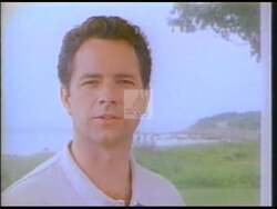["In a 1996 political TV ad, Democratic candidate Ian Bowles stands against scenic coastlines, passionately advocating for environmental protection and local economic growth. Across multiple scenes, he emphasizes his opposition to Newt Gingrich's policies, pledging to safeguard coastal areas and push for necessary policy reforms to benefit both the environment and local communities."]