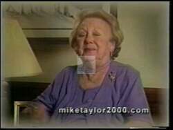 ["In his 2000 Presidential campaign ad, Democratic candidate Mike Taylor consistently used the symbolism of a bar of soap to emphasize his commitment to \"clean up the mess\" in Washington. Repeatedly addressing the camera directly in various settings, Taylor earnestly promoted his \"Taylor Plan,\" promising political reform and honesty. His messaging was supported by a campaign poster backdrop emphasizing these themes."]