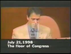 ["In the 1998 political TV ad, Democratic candidate Rush Holt criticizes opponent Congressman Michael Pappas for his alignment with Kenneth Starr's controversial actions, portraying him as politically misguided. The ad uses dramatic visual framing to emphasize Pappas in a negative light, aiming to sway voter opinion in Holt's favor."]