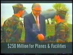 ["In his 1998 presidential campaign ad, Democratic candidate John Joseph LaFalce showcases his dedication to public service through a series of powerful scenes. He is seen speaking passionately about enhancing community and educational funding, reinforcing his commitment while positioned in his office adorned with American flags, surrounded by paperwork symbolizing his commitment to effective leadership and advocacy for progressive change."]