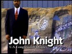 ["In the 1992 campaign ad, Democratic candidate John Knight passionately advocates for crucial societal issues. He addresses gatherings from behind a podium, discussing his dedication to enhancing public safety, strengthening education, and implementing effective gang prevention strategies, ensuring his commitment to creating a safer, better-educated community."]