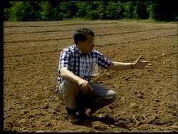 ["In his 1992 campaign ad, presidential candidate Larry Lee presents a consistent message of change and integrity. Set against varied backdrops including farms and Capitol Hill, Lee addresses the viewers with a stern and serious demeanor. He passionately criticizes political mismanagement and corruption, advocating for significant reforms in agriculture and political accountability, while urging action and integrity throughout Congress."]