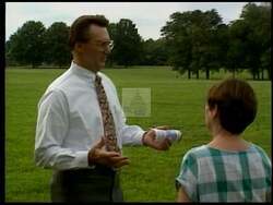 ["Fred Arbanas's 1992 presidential campaign ad skillfully blends imagery of his football prowess with political messaging. The advertisement portrays Arbanas in both athletic and suited attire, symbolizing his dual commitment to physical strength and fiscal responsibility. Scenes transition from football tackles to podium speeches, illustrating his determination and leadership, aiming to resonate with voters who value both strong physical and political resolve."]