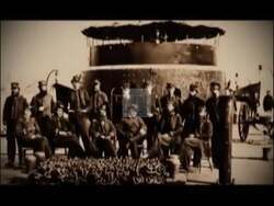 ["In his 2009 campaign ad, Democratic Party candidate Bill Owens highlights his military background and family history to connect with voters. The ad features Owens at various locations, including a repurposed military building and the Plattsburgh Air Force Base, emphasizing his commitment to job growth and economic revitalization in upstate New York."]