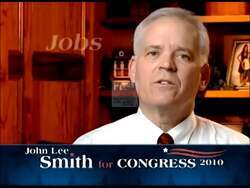 ["John Lee Smith's 2010 presidential campaign ad features him consistently advocating for job creation, minimal government, and strong moral values. Using various professional settings, including factories and podiums adorned with American flags, Smith positions himself as a Reagan-esque leader committed to reinvigorating the nation's economy and reducing government size. He speaks earnestly, seeking to evoke passion and gather support through promises of prosperity and conservative governance."]