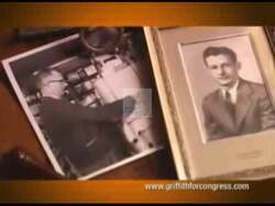 ["In his 2008 political TV ad, Republican candidate Parker Griffith addresses voters from a kitchen table, symbolizing the intimacy and seriousness of familial economic concerns. Appearing sincere and determined, Griffith speaks about parental fears and the American Dream, emphasizing his commitment to addressing and improving these crucial issues."]