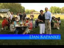 ["In the 2010 political ad, Republican candidate Dan Kapanke campaigns for Congress, consistently emphasizing fiscal responsibility. Surrounded by his family in various rural and homely settings, Kapanke passionately discusses the importance of addressing government spending and personal responsibility, aiming to connect with voters on shared values of financial prudence."]