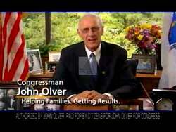 ["In this 2006 campaign ad, Democratic candidate John Olver positions himself as a dedicated, serious politician advocating for family support and innovative energy solutions. Speaking from various settings, Olver highlights his legislative accomplishments and presents his visions for future policies. His earnest demeanor underscores his commitment to public service."]