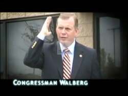 ["In a pointed political attack ad from 2010, scenes of abandoned factories and jobless workers starkly criticize Congressman Tim Walberg for his support of policies that advocate outsourcing. The ad effectively uses visuals of desolation in Michigan's industries to argue that Walberg's decisions contributed to significant local economic and employment declines."]