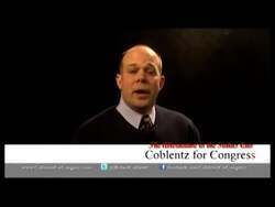["In the 2012 campaign ad, Republican candidate Robert Koblentz emphasizes urgent political and economic reforms. Throughout various scenes, he projects confidence and determination while speaking at podiums, often flanked by U.S. flags. The ad underscores Koblentz's commitment to fiscal responsibility and a revitalized economy, aiming to resonate with viewers' sense of national pride and urgency for change."]