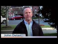 ["In a dynamic political TV ad, Democratic candidate John Delaney campaigns for Congress, passionately advocating for job creation, progressive values, and vital political reforms. Amid numerous backdrops with American flags and campaign posters, Delaney stands confident and determined, addressing viewers directly, emphasizing his commitment to improving Congress and supporting middle-class families."]