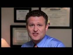 ["In his 2012 political ad, Republican candidate Jack Lugar earnestly appeals for support in his run for Indiana's 5th Congressional District. As he stands with his family and American flags, Lugar emphasizes reform, family values, and addressing key national issues. His serious and passionate demeanor underscores a commitment to change and conservative values."]