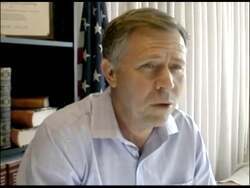 ["In Kevin Lundberg's 2012 presidential campaign ad, multiple scenes emphasize his concerns about the U.S. federal debt. Highlighting a firm stance on economic policies, Lundberg and various speakers focus on federal debt reduction strategies, stable tax policies, and the negative impact of debt on economic growth, using visuals like charts, whiteboards, and emphatic gestures for emphasis."]