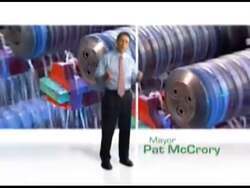["In his 2012 political TV advert, Republican candidate Pat McCrory stands confidently at various podiums, emphasizing his commitment to job creation, education reform, and tax reduction. Scenes feature him advocating for offshore drilling and presenting a leadership focused campaign, all amidst patriotic and coastal imagery to underscore his priorities for governorship."]
