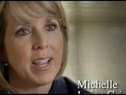 ["In her 2012 political TV ad, Democratic candidate Michelle Lujan Grisham passionately advocates for justice, equality, and community fairness. Speaking directly to the camera in various settings, including a professional office and an outdoor area with campaign signs, she emphasizes her dedication to supporting seniors, creating jobs, and implementing fair taxes, specifically highlighting her commitment to improving conditions for New Mexicos middle class."]