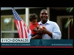["In Byron Donalds' 2012 presidential campaign ad, he introduces himself alongside his young son, Mason, emphasizing the importance of citizen-led governance for future generations. Throughout the ad, Donalds advocates for civic responsibility and discusses America's future with Mason, highlighting patriotic concerns and family values to connect with voters on a personal level."]