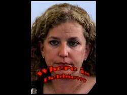 ["In the 2012 political ad for Republican candidate Karen Harrington, the ad features repeated scenes of Harrington on stage expressing heartfelt gratitude to an audience. Different angles capture her acknowledging applause with humble smiles and appreciative gestures, creating an emotional and sincere connection with the viewers and emphasizing her thankfulness."]