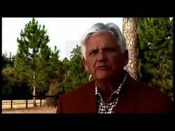 ["In his 2012 presidential campaign ad, Republican Steve Olger confidently addresses the nation, advocating for significant reforms including fiscal responsibility, tax reform, and energy independence. He emphasizes these priorities while speaking from various settings including an office and a podium, always with the American flag in the backdrop."]