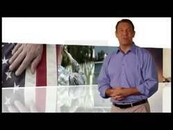 ["In the 2012 campaign ad, Republican candidate Trey Radel speaks earnestly against a recurring backdrop of American flags. He criticizes government inefficiency, corruption, and failures while emphasizing the need for political reform and citizen empowerment. Radel urges viewers to take action to reclaim America's greatness, advocating for a responsible, reformed governance. He concludes by approving the message, emphasizing accountability and patriotic duty."]