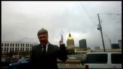 ["In a 2014 political TV ad, Republican John Erwin Stone, outside Georgia's Gold Dome, officially announced his candidacy for Congress. He passionately highlighted the urgent need for dynamic, conservative leadership and a significant change from the existing political establishment, emphasizing his qualification for Georgia's 12th district congressional race."]